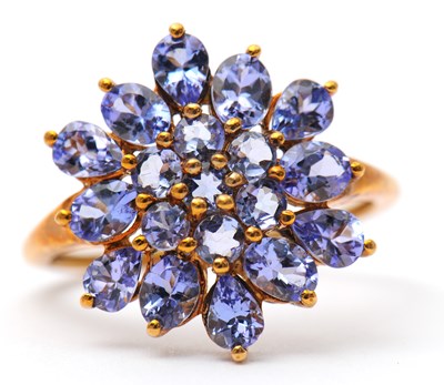 Lot 17 - A 9ct tanzanite cluster ring, the cluster...