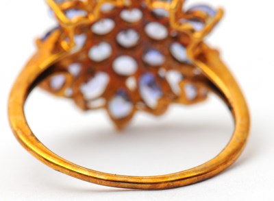 Lot 17 - A 9ct tanzanite cluster ring, the cluster...