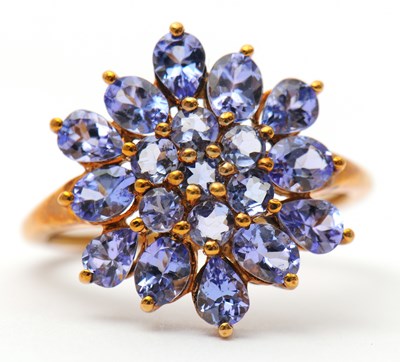 Lot 17 - A 9ct tanzanite cluster ring, the cluster...