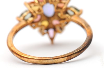 Lot 18 - A 9ct multi gemset ring, set with oval and...