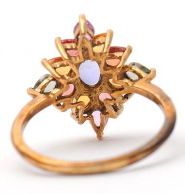 Lot 18 - A 9ct multi gemset ring, set with oval and...