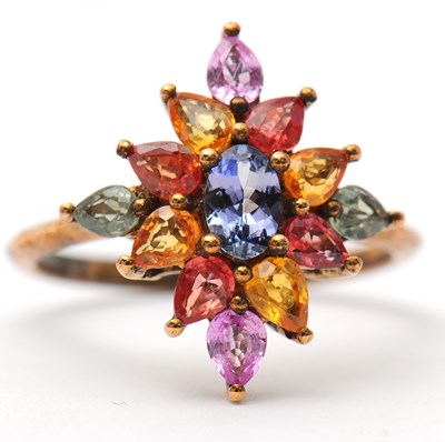 Lot 18 - A 9ct multi gemset ring, set with oval and...