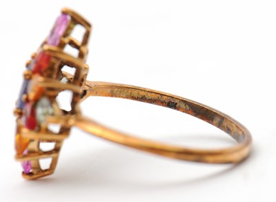 Lot 18 - A 9ct multi gemset ring, set with oval and...