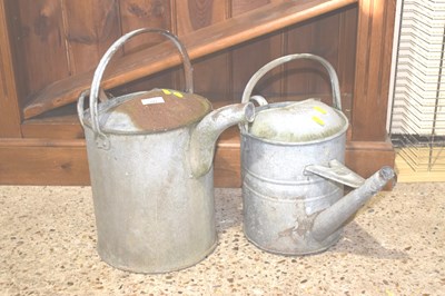Lot 297 - Two galvanised watering cans