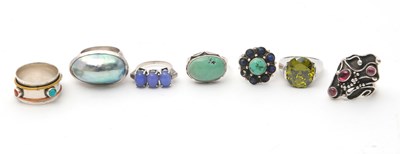 Lot 143 - Seven silver rings: to include mabe pearl,...