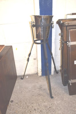 Lot 313 - A wine cooler on iron stand