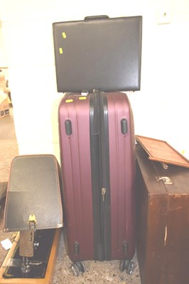 Lot 315 - A wheeled suitcase and a briefcase