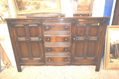 Lot 332 - An Ercol dark finish sideboard