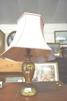 Lot 369 - A gilt finish table lamp