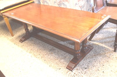 Lot 381 - A reproduction rectangular coffee table on...