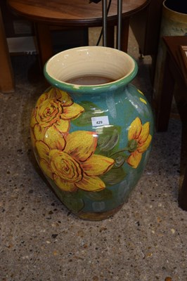Lot 429 - A large pottery floral decorated vase