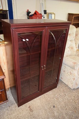 Lot 463 - A dark wood finish display cabinet