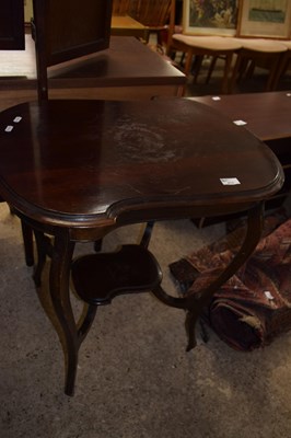 Lot 474 - An Edwardian mahogany two tier lamp table on...