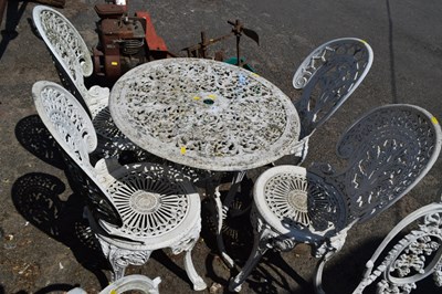 Lot 482 - A cast aluminium garden table and four chairs