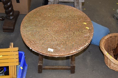 Lot 820 - A copper topped coffee table