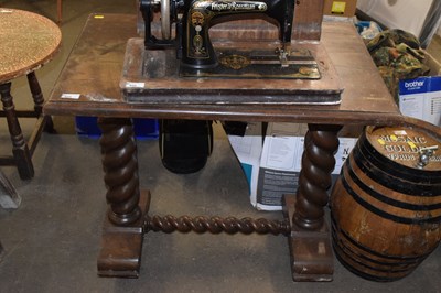 Lot 825 - A small hardwood table on barley twist frame
