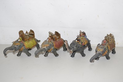 Lot 511 - Group of four cast metal model elephants