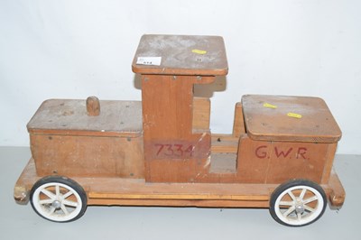 Lot 514 - Child's pull along wooden train