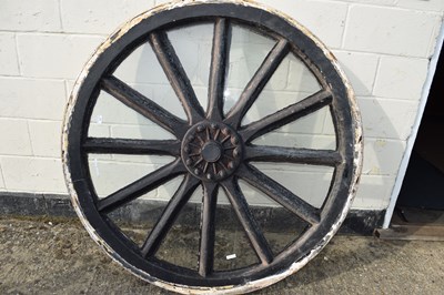 Lot 394 - Large 12-spoke iron mounted cartwheel, the...