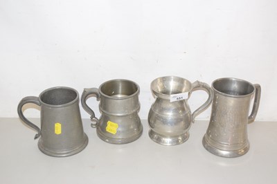 Lot 551 - A group of four pewter tankards