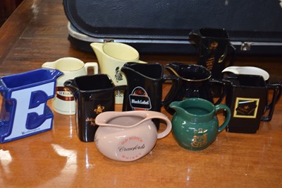 Lot 401 - Collection of 11 various Wade pub jugs with a...