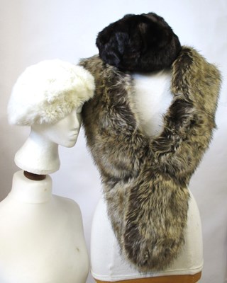Lot 148 - A mixed lot: to include a fur hat, a white fur...
