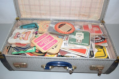 Lot 608 - Vintage suitecase and qty of beer mats