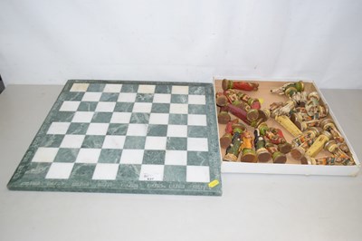 Lot 637 - Hardstone chessboard and wooden chess pieces