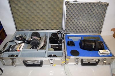 Lot 6 - Two hardshell camera cases and a qty of...
