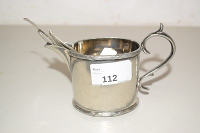 Lot 112 - White metal milk jug and silver teaspoons and...