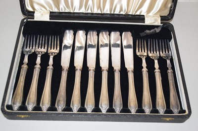 Lot 115 - A set of six silver handled fish knives and forks