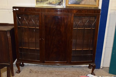 Lot 260 - A bow front cabinet with glazed doors and...