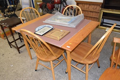 Lot 330 - Pine kitchen table and four chairs