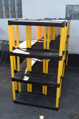 Lot 358 - Six black and yellow plastic shelf units
