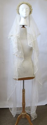 Lot 15 - A wedding veil, c.1920-30, with beaded floral...