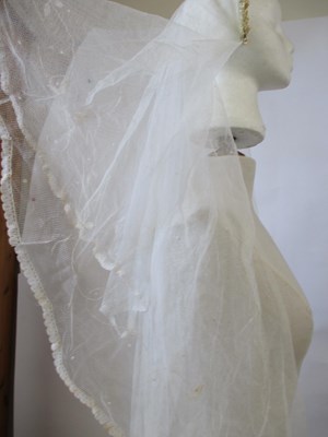 Lot 15 - A wedding veil, c.1920-30, with beaded floral...