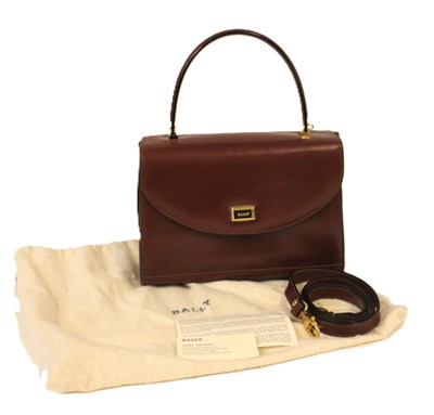 Lot 175 - Bally: a brown leather bag, with foldover flap...