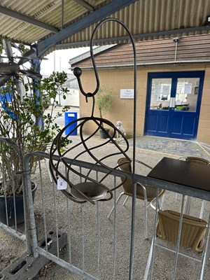 Lot 194 - Metal Garden Stake, with a hanging decorative...