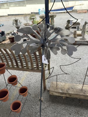 Lot 200 - Decorative metal stake with flower, approx 41"...