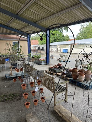 Lot 201 - Large decorative metal stake in the shape of a...