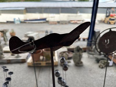 Lot 202 - Metal garden Stake, mounted with a decorative...
