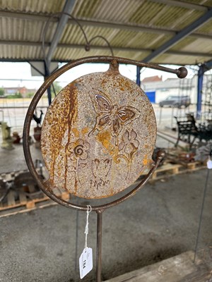 Lot 210 - Decorative metal stake featuring butterflies...