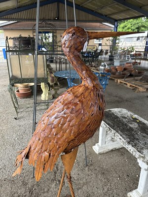 Lot 178 - A large metal decorative sculpture of a stork,...