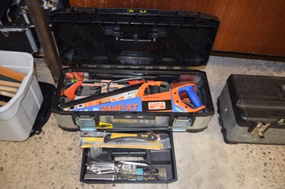 Lot 21 - A Stanley toolbox containing various saws