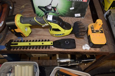 Lot 37 - A Ryobi mini hedge trimmer and two batteries