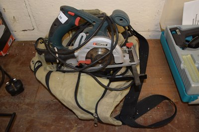 Lot 90 - A bag containing a Parkside electric circular saw