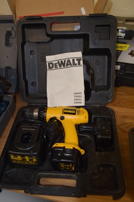 Lot 105 - A DeWalt battery drill, in box containing...