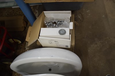 Lot 153 - A bathroom basin, tap and pedestal