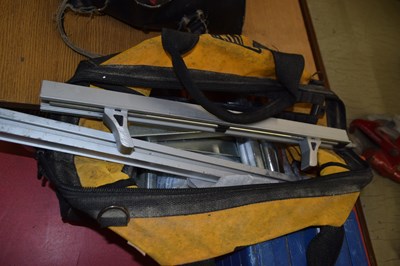 Lot 183 - Bag containing various clamps, table rollers...