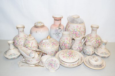 Lot 148 - A quantity of Portuguese floral decorated...